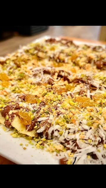 Sweet feteer topped with nuts